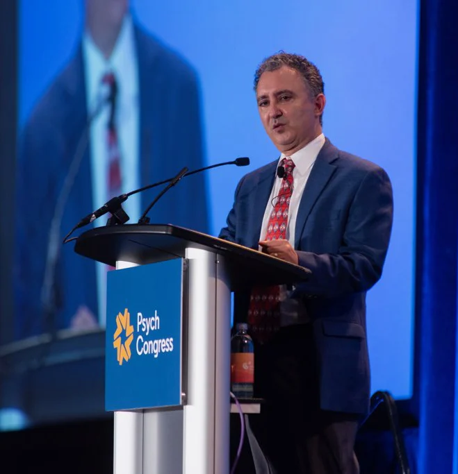 Dr. Nassir Ghaemi speaking at a psychiatry congress